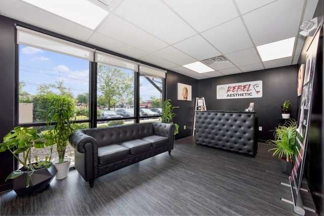 Comfortable client area inside Rebel Aesthetics studio.